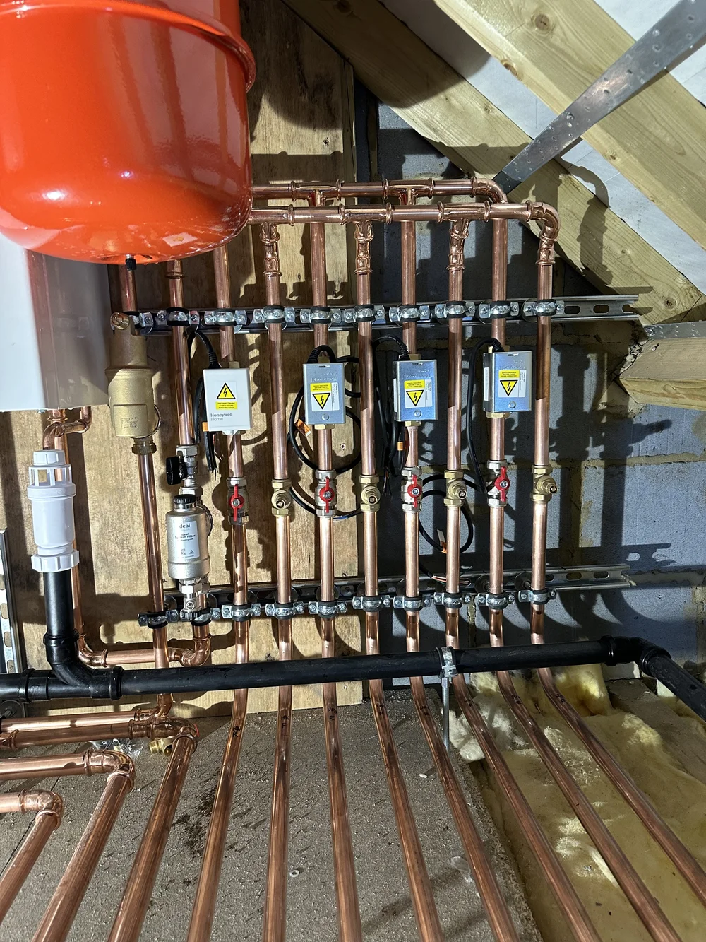 Copper manifold with zone valves, filter and expansion vessel — heating and plumbing Haslemere