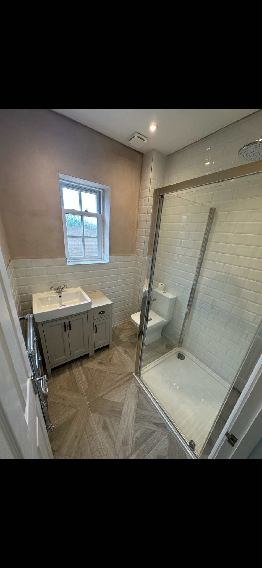 Traditional cloakroom shower room with grey shaker vanity, metro tiles and parquet floor — bathroom renovation Haslemere